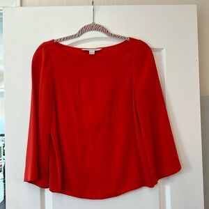 Diane von furstenburg top with detail. Beautiful red/orange color gently used